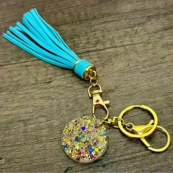 Gold Tone Keychain with Hand Crafted Sparkles Amulet and Teal Tassel - Picture 1 of 2